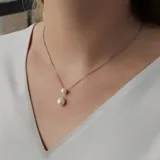 Conjunto de collar en plata 925 con perlas de río y circonias, con un largo de cadena de 42 cm.