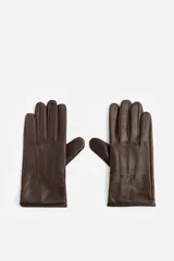Guantes de cuero marrón con forro interior de punto y ajuste elástico en la muñeca.