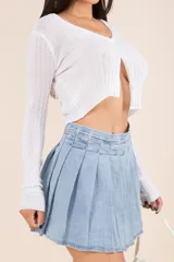 Minifalda tableada de jean con short por debajo.
