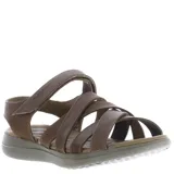 Sandalia de cuero marrón con múltiples tiras y ajuste con velcro.
