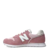 Championes New Balance modelo 373 para mujer, color rosado (rosa viejo/dusty rose) con detalles en gris claro y blanco. Presentan una combinación de gamuza y malla, con el logo 'N' en blanco y entresuela blanca con suela exterior gris.