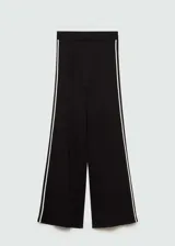 Pantalón largo acampanado de punto fino color negro, con cintura elástica alta y detalle de pipping en contraste blanco en los laterales.