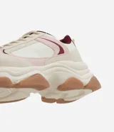 Championes chunky femeninas de la marca Satinato, confeccionadas en PU texturizado con paneles superpuestos en tonos beige, rosado y bordó. Cuentan con cierre de cordones, entresuela con diseño en capas y suela robusta de goma.