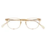 Lentes de eco acetato color crema, de forma redonda.