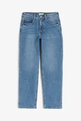 Jean de cinco bolsillos en denim de algodón levemente elástico. Modelo de corte ajustado con tiro alto, cierre con botón y piernas tobilleras.