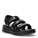 Sandalias negras con plataforma, tobillera y tiras con ajuste de velcro.