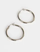 Aros argolla dorados de acero quirúrgico.