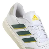 Championes Adidas Urban Courtblock blancos con detalles en verde y amarillo, y puntera y talón en gamuza gris.