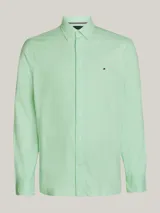 Camisa de hombre Tommy Hilfiger, modelo 1985 TH Flex, color verde claro. Corte regular, cuello abotonado, mangas largas con puños abotonados y logo bordado en el pecho. Confeccionada en algodón Oxford orgánico con Flex Technology.