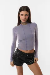 Top de morley de algodón con lycra color lila, de mangas largas y cuello redondo.