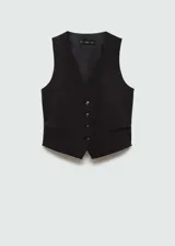 Chaleco azul marino con cuello en V, cierre frontal con botones y dos bolsillos de ribete delanteros. Diseño recto y sin mangas.