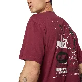 Remera de hombre color bordó con logo Puma estampado en el pecho.