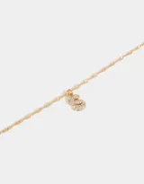 Cadena corta dorada con dije de la letra A cubierto de strass.