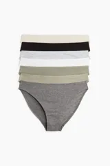 Pack de siete bombachas de algodón en colores beige, negro, gris jaspeado, blanco, verde oliva, verde musgo y gris.