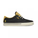 Championes Etnies Jameson 2 Eco, color negro con detalles en amarillo mostaza y suela color crema.