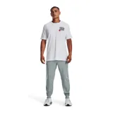Pantalón de jogging Under Armour Sportstyle Tricot color azul petróleo, de corte ajustado, con cintura elástica ajustable con cordón y bolsillos laterales.
