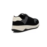 Championes urbanos Br Sport, color azul marino con detalles en camel, confeccionados en tela y cuero sintético, con cordones y suela de goma blanca.