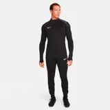 Camiseta de entrenamiento Nike Dri-Fit Strike Dril Top negra de manga larga con cuello alto con cremallera corta y logo de la marca en el pecho.