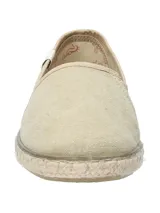 Alpargatas color ocre con suela de yute y goma.
