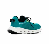 Zapatillas Columbia Drainmaker XTR para hombre, color negro con detalles en verde y suela beige. Diseño sin cordones, con capellada de malla de secado rápido, entresuela ligera con puertos de drenaje y suela de goma con micro ranuras para mayor tracción.
