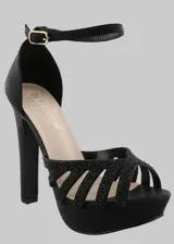 Sandalias negras de fiesta con plataforma y taco alto. Tiras cruzadas con detalle de strass.