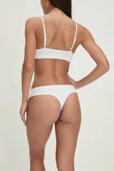 Pack de tres colaless de algodón en color gris con cintura elástica blanca.