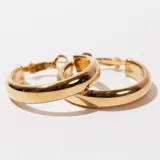 Aros tipo argolla dorados de acero.
