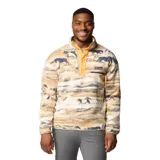 Buzo polar Columbia Helvetia Snap Fleece con estampado de caballos en tonos beige, marrón y azul. Tiene cuello alto con botones a presión, bolsillo en el pecho con cierre y logo de la marca bordado.