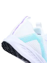 Championes de running Umbro Primus para mujer, color negro con detalles en blanco y suela blanca con detalles en rosa.