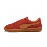 Championes Puma Palermo negros con detalles en blanco y suela color caramelo.