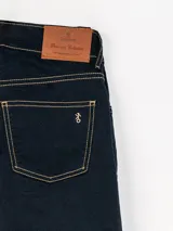 Pantalón chupín blanco de gabardina de algodón elastizada.
