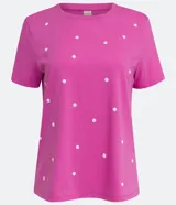 Remera rosa de algodón con cuello redondo y lunares blancos.