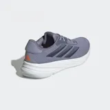 Championes de running Adidas Supernova Ease color gris con detalles en azul y negro. Presentan las tres tiras características de la marca en los laterales y suela blanca con tecnología Dreamstrike.