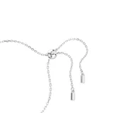 Pulsera plateada con hilera de cristales blancos y un cristal amarillo champagne central. Ajustable con cierre deslizante.