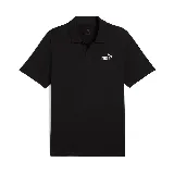 Polo negra de piqué con cuello clásico, tapeta de dos botones y logo Puma bordado en blanco en el pecho.
