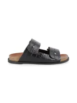 Sandalias negras con textura de cocodrilo, dos tiras anchas sobre el empeine y plantilla de corcho.
