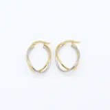 Aros tipo argolla dobles, uno dorado y otro plateado, de oro 18k.
