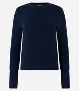 Blusa de punto rosa con textura acanalada, cuello redondo y mangas largas.
