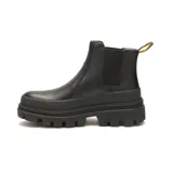 Botín Chelsea CAT Footwear Hardwear, color negro, con elástico lateral y tirador trasero amarillo. Suela chunky con plataforma y dibujo dentado.