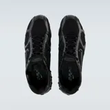 Championes Nike Air Zoom Spiridon Cage 2, color negro, con capellada de malla y detalles de cuero sintético.