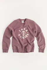 Sudadera lila de algodón con cuello redondo y mangas largas. Estampado en el frente con el logo "Zara A Coruña" y el texto "Est. 1975".