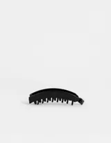Broche para el pelo tipo banana de acrílico negro con acabado mate.