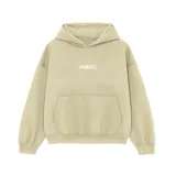 Buzo hoodie color beige, corte oversize, con bolsillo tipo canguro y bordado frontal con la palabra 'VENEVO'.