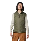 Chaleco acolchado Columbia Heavenly II para mujer, color negro, con forro termorreflectante Omni-Heat™, cuello de felpa forrado de vellón, cierre frontal de dos vías, bolsillos laterales con cremallera y bolsillo interior de seguridad.