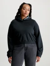 Buzo cropped negro de punto milano con capucha y mangas largas. Tiene puños de canalé y bajo elástico. El logo de Calvin Klein Jeans está bordado en la capucha.