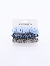 Pack de tres coleros de tela elastizada: uno celeste liso, uno gris con estampado de flores negras y uno gris liso.