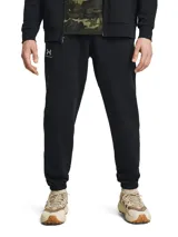 Pantalón de jogging Under Armour Icon Fleece, color negro, con logo bordado en la pierna izquierda. Confeccionado en tejido Fleece que mantiene el calor y es cómodo para usar antes de un partido o para entrenar. Tiene cintura elástica con cordón ajustable y puños acanalados.