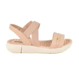 Sandalias bajas color beige con plataforma blanca y tiras cruzadas.