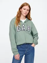 Canguro con cierre de la marca Gap, color verde claro, con capucha y logo estampado en el frente.