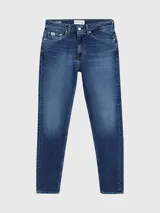 Jeans de corte tapered con bragueta de cremallera y diseño de cinco bolsillos, en lavado azul medio vintage.